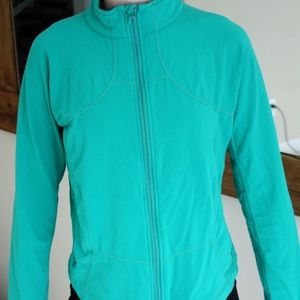 Lululemon, Size M/8,  turquoise/green zip up jacket, w/o hood w/ front pockets